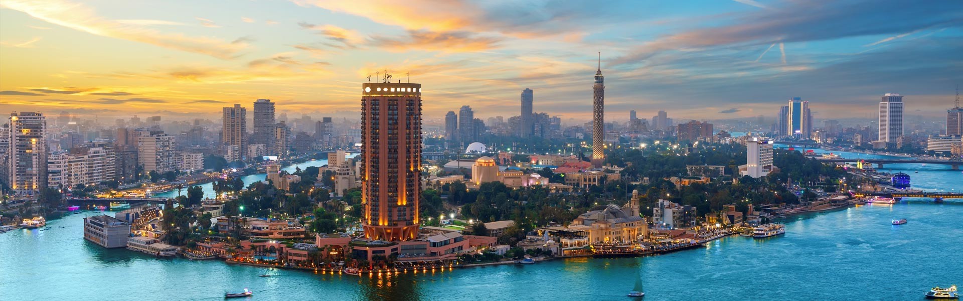 Cairo cityscape with illuminated streets, bustling markets, and Nile views